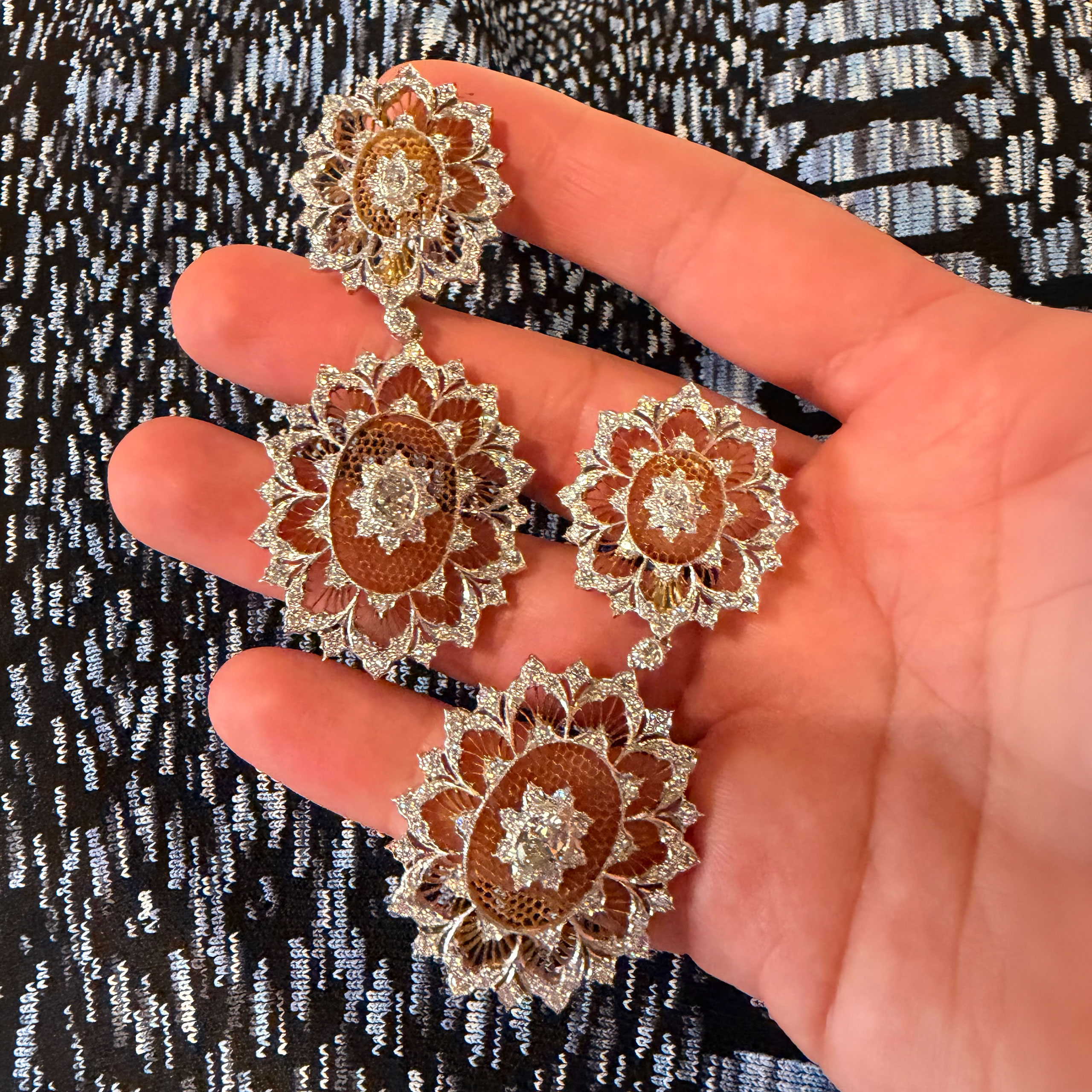 Buccellati's diamond cocktail pendant earrings feature in intricate honeycomb design