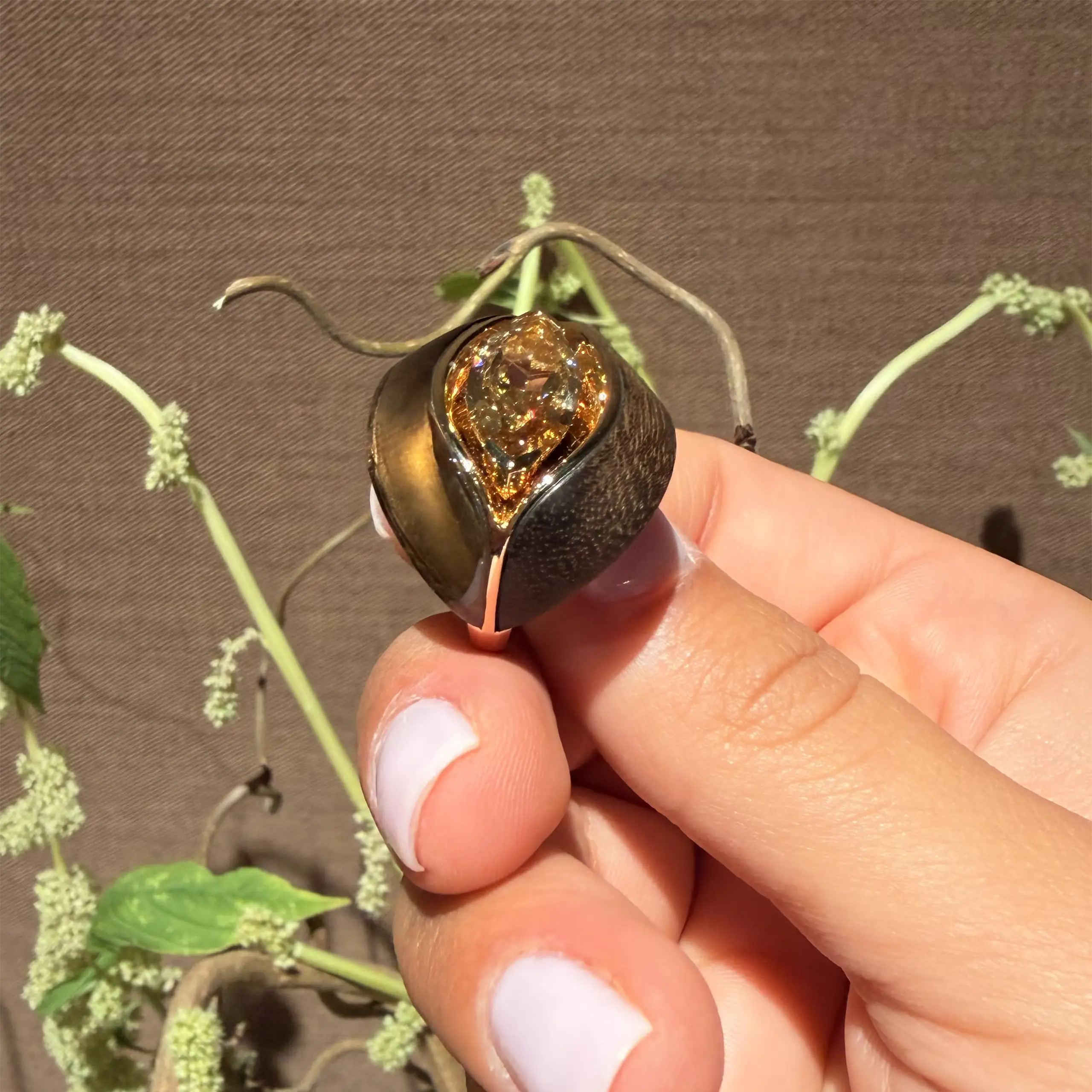 Armour ring with carved smoky quartz, hand-carved Brazilian Preciosa wood and a marquise-cut brown diamond
