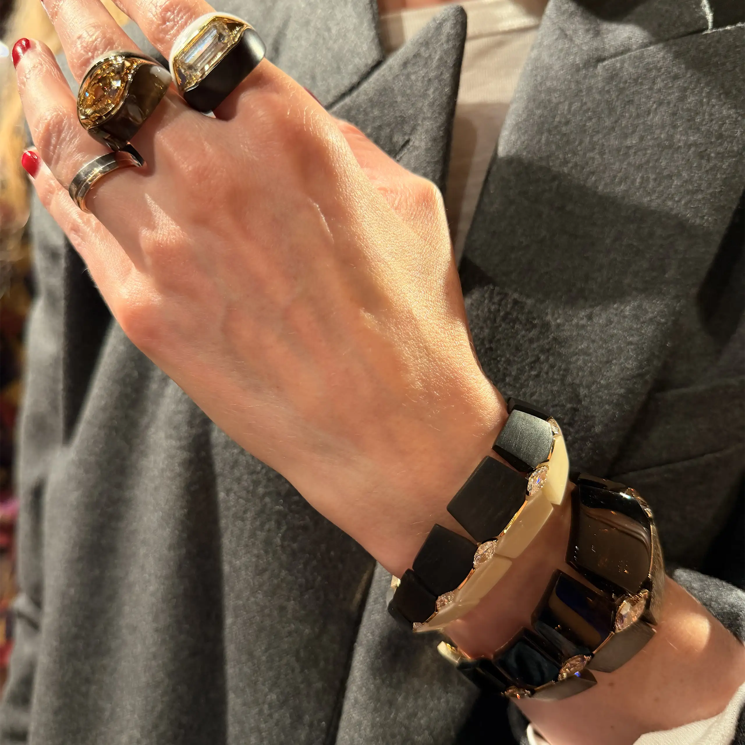 The Armour collection takes the shield as its central form and divides it into segments of contrasting materials