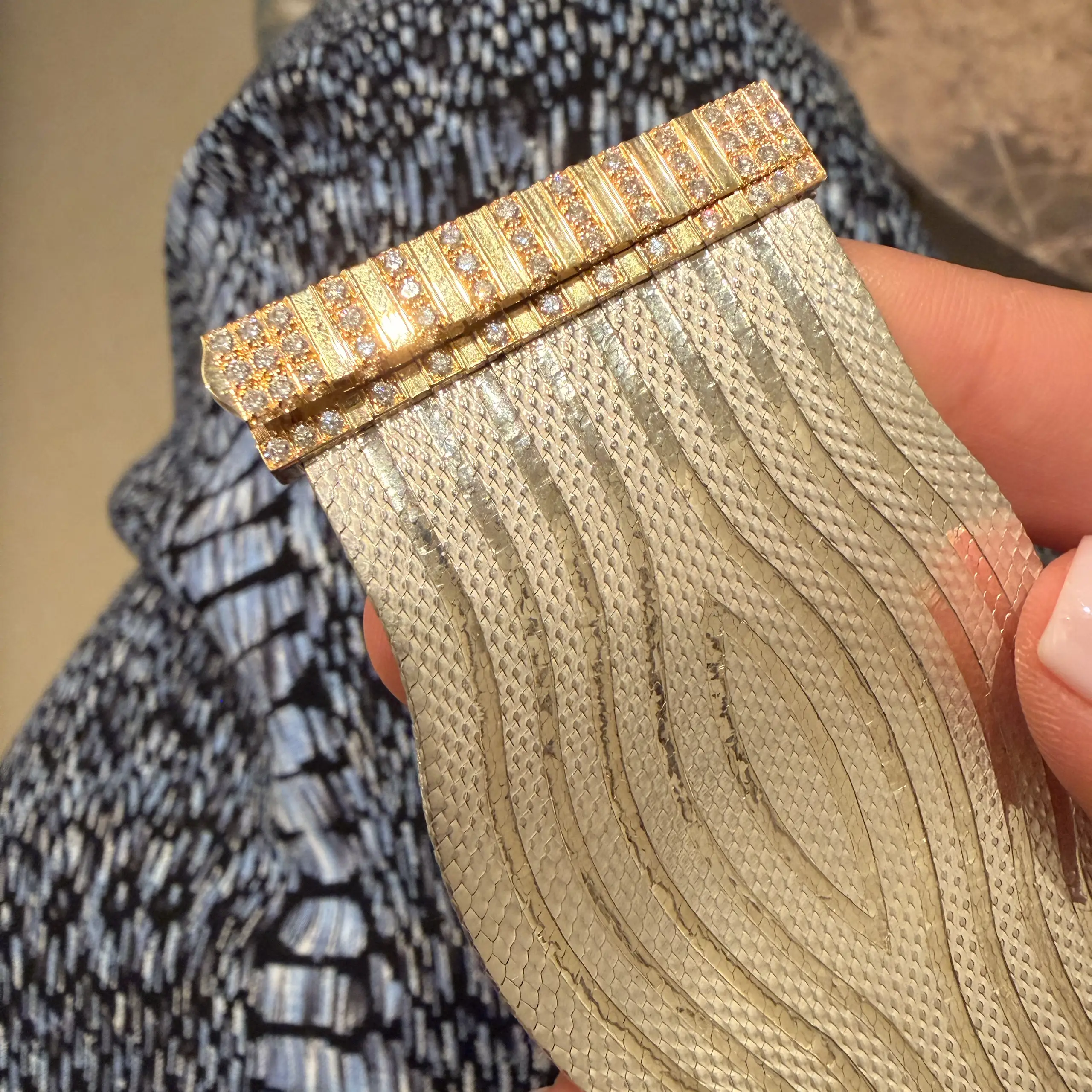 Incredibly flexible, hundreds of tiny gold strands come together in waves
