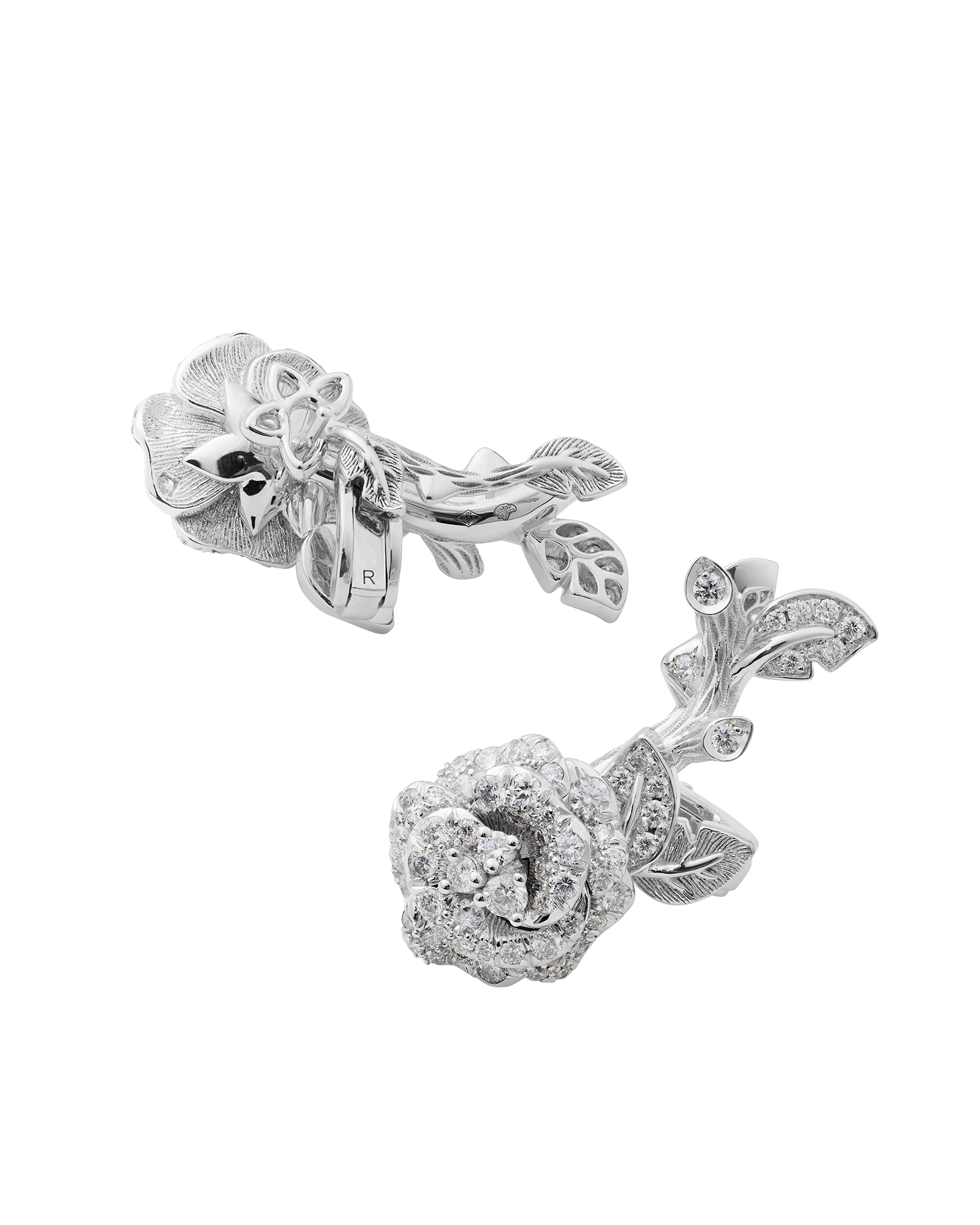 The Rose Dior Bagatelle earrings combine white gold, pavé diamonds and layered rose petals