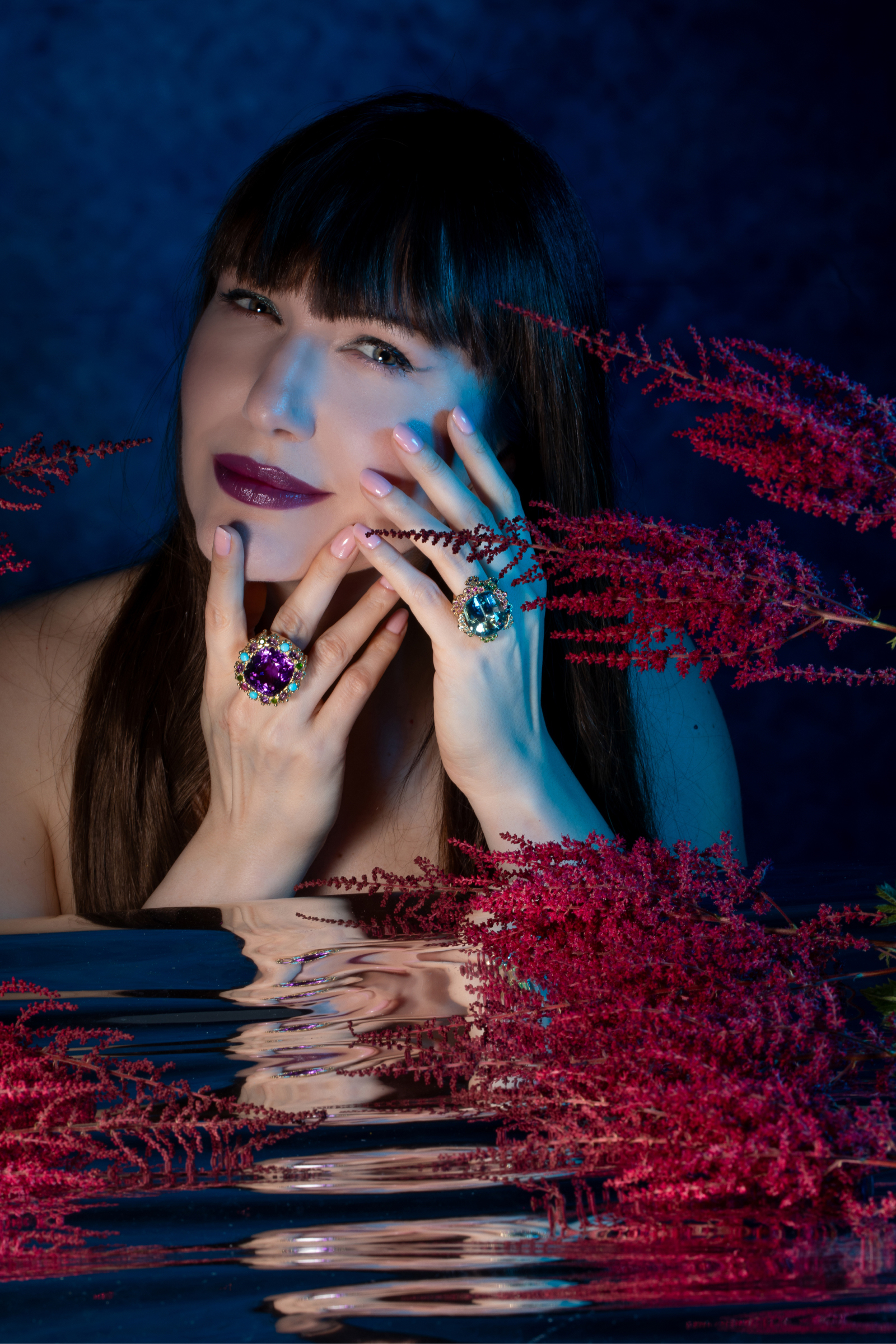 Garnazelle Joaillerie Hatching ring (left) with a 22.12-carat peridot, 1.45 carats of purple sapphires, and tsavorite garnets in 18k recycled white gold, alongside the Sicis Daydream Lace ring from the Tesserae collection with a 7.50-carat peridot, 1.50-carats of diamonds, and micromosaics, set in 18k white gold