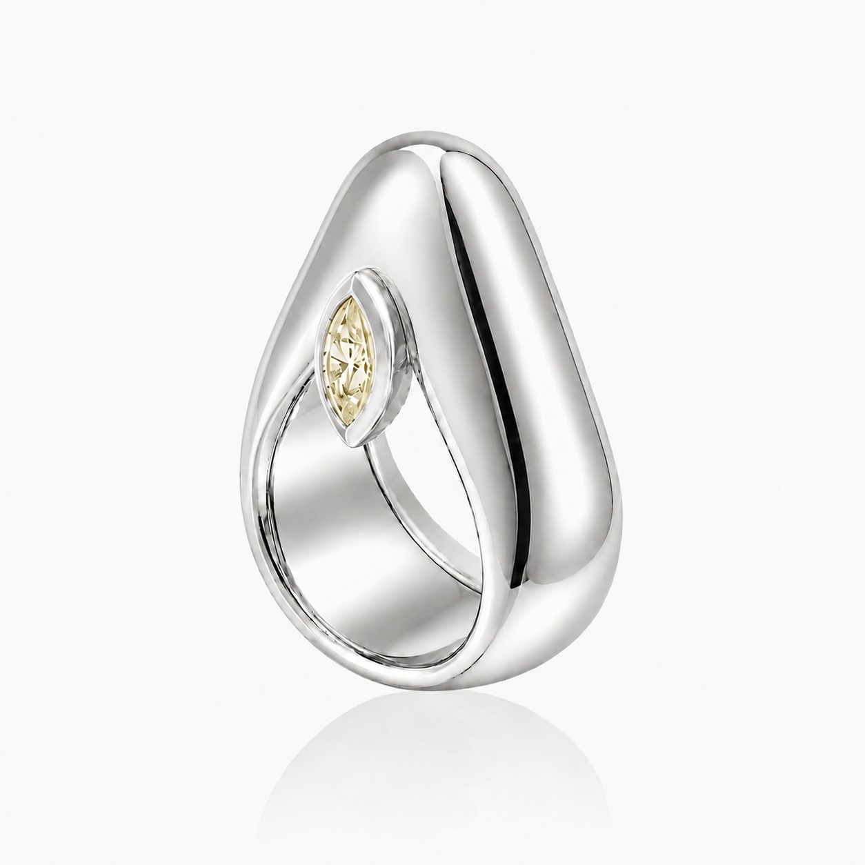 Salima Thakker's Grid ring takes the familiar circle of a band and pulls it into a pyramidal silhouette