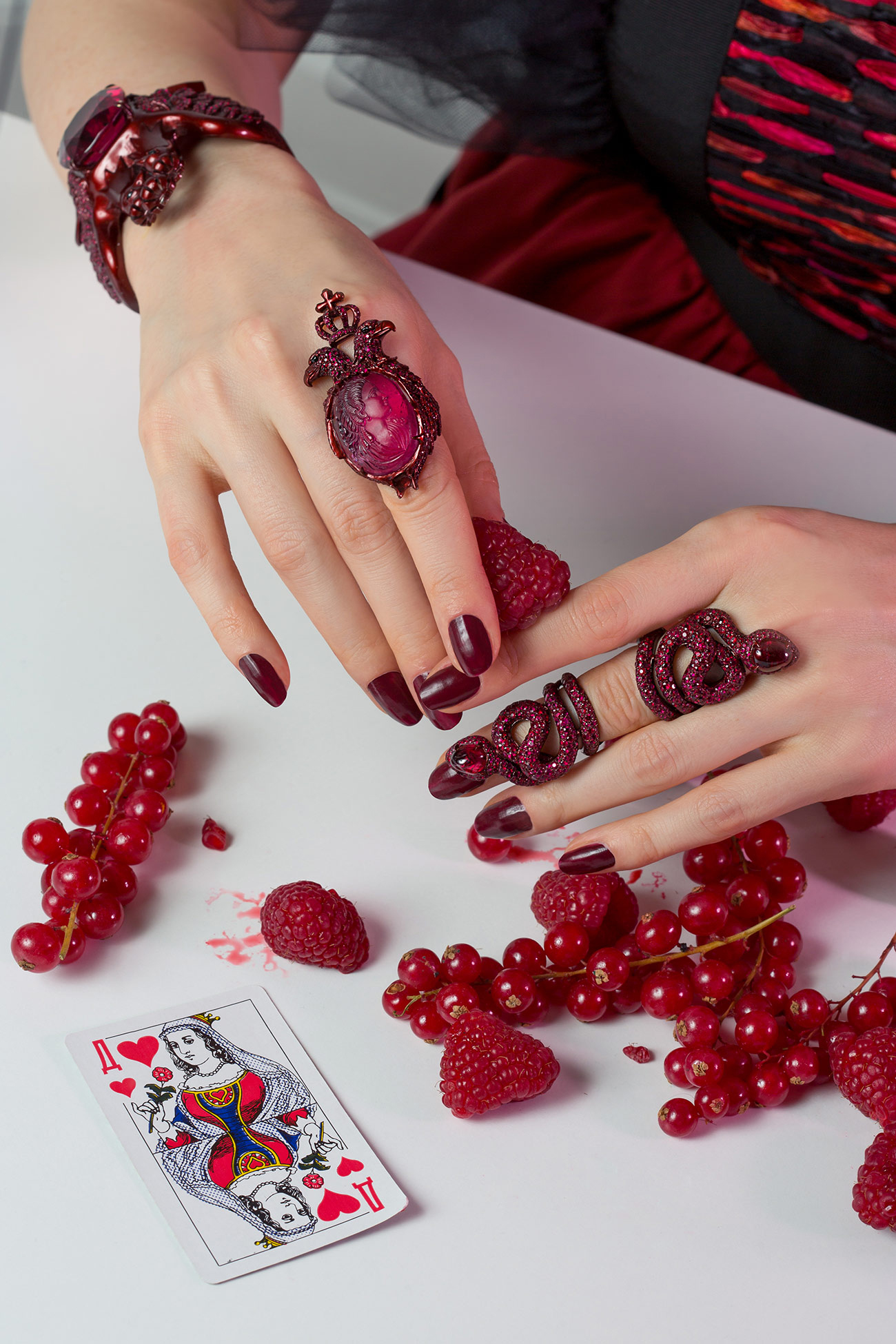 Queen of Hearts Lydia Courteille cuff in 18k gold with 729 rubies, black spinels and a 90-carat rubellite tourmaline; Catherine II ring in 18k gold with 359 rubies of 6.78 carats, four black spinels and a 37.20 carat red tourmaline carved with the image of Catherine the Great of Russia; Red Snake ring with 722 rubies of 7.25 carats and spinels, all from the Scarlett Empress Collection.